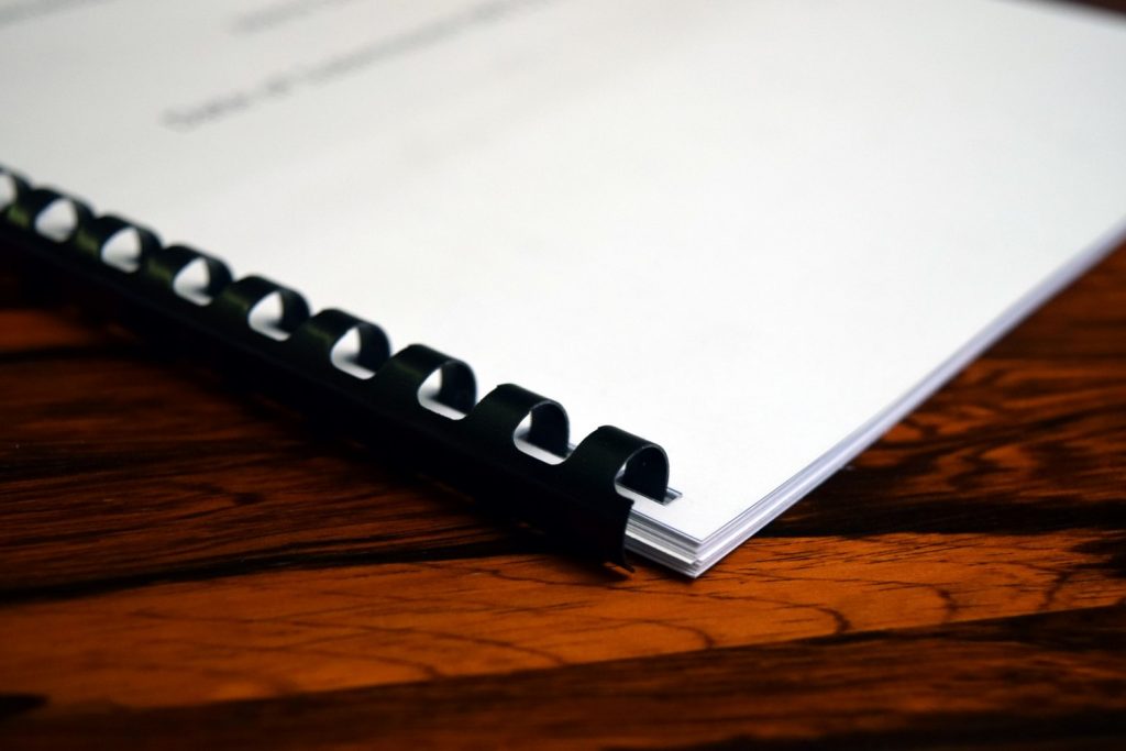 a book on wooden table