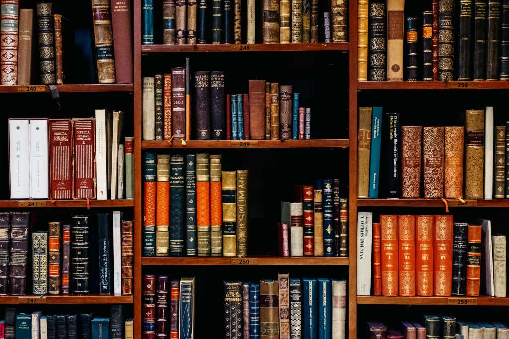 books piled in the shelves