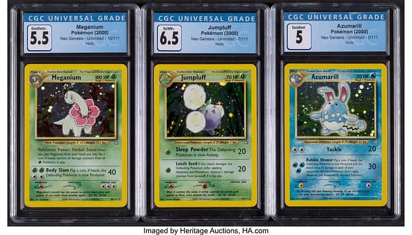 Three holographic Pokemon cards