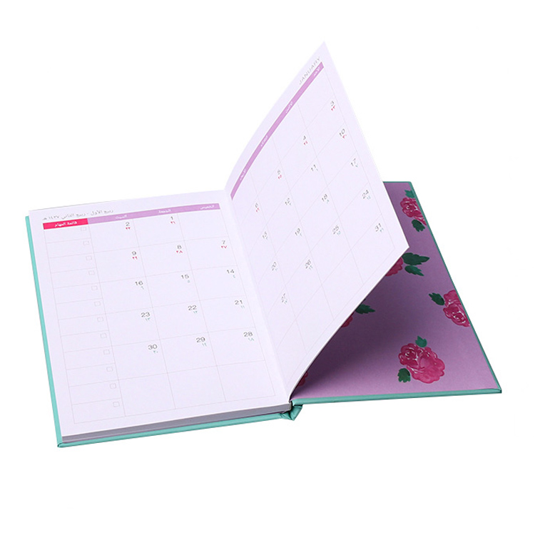 green cover hardcover notebook